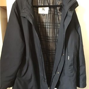 Man,s Black Burberry jacket.